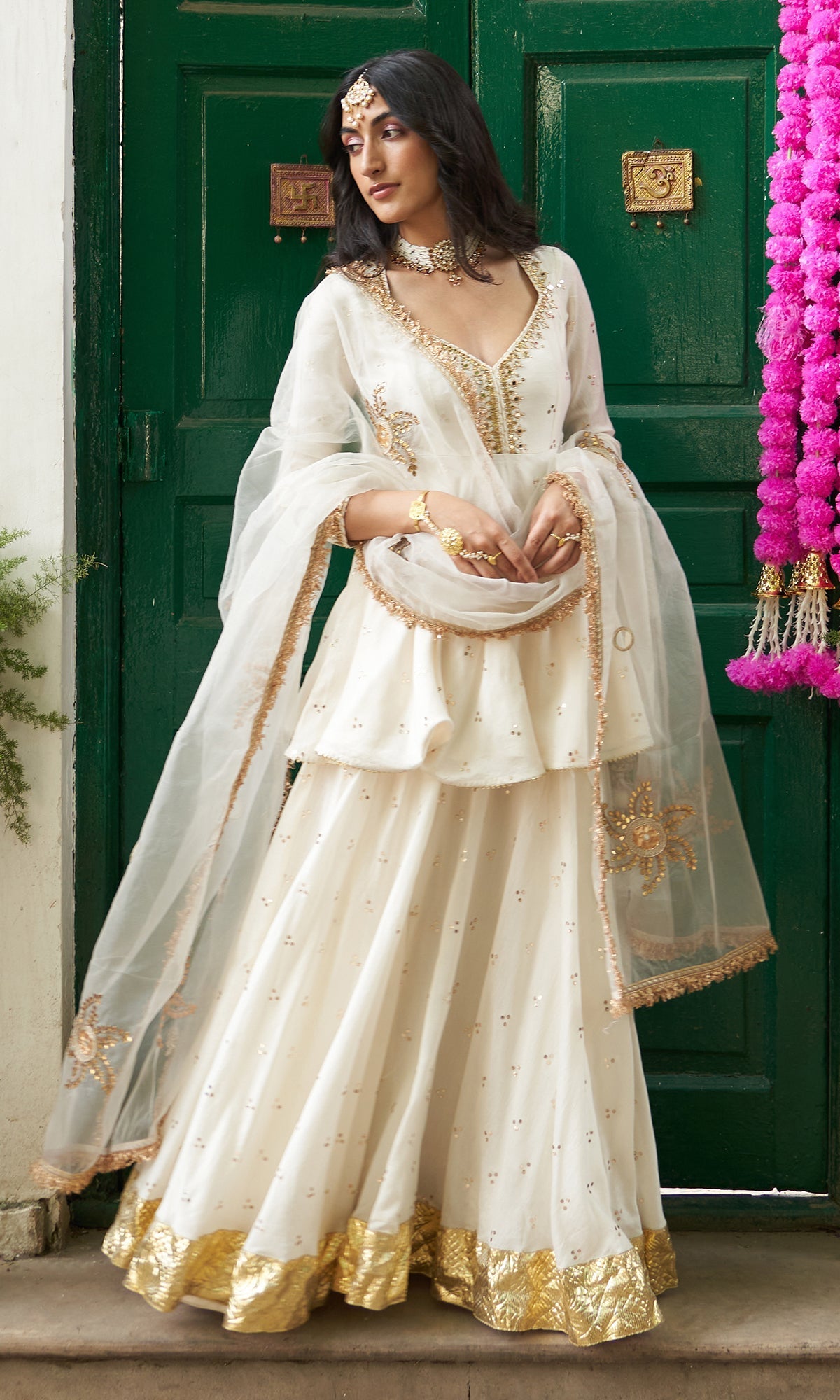 Divya Khosla Kumar in Jhilmil White Lehenga With Kurta And Dupatta Set Of 3