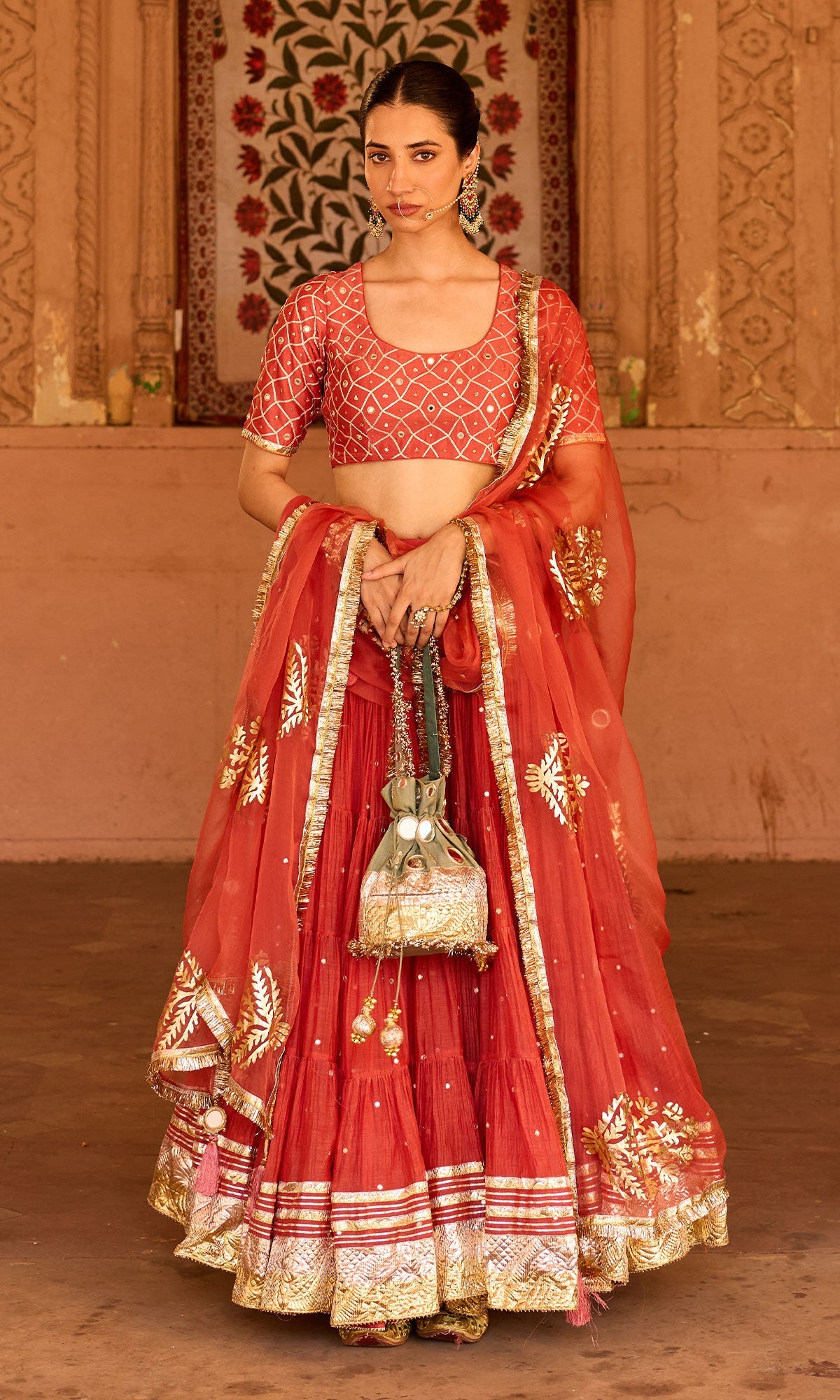 Phillauri 2 rust teared lehenga with gota work blouse and foil print dupatta (set of 3)