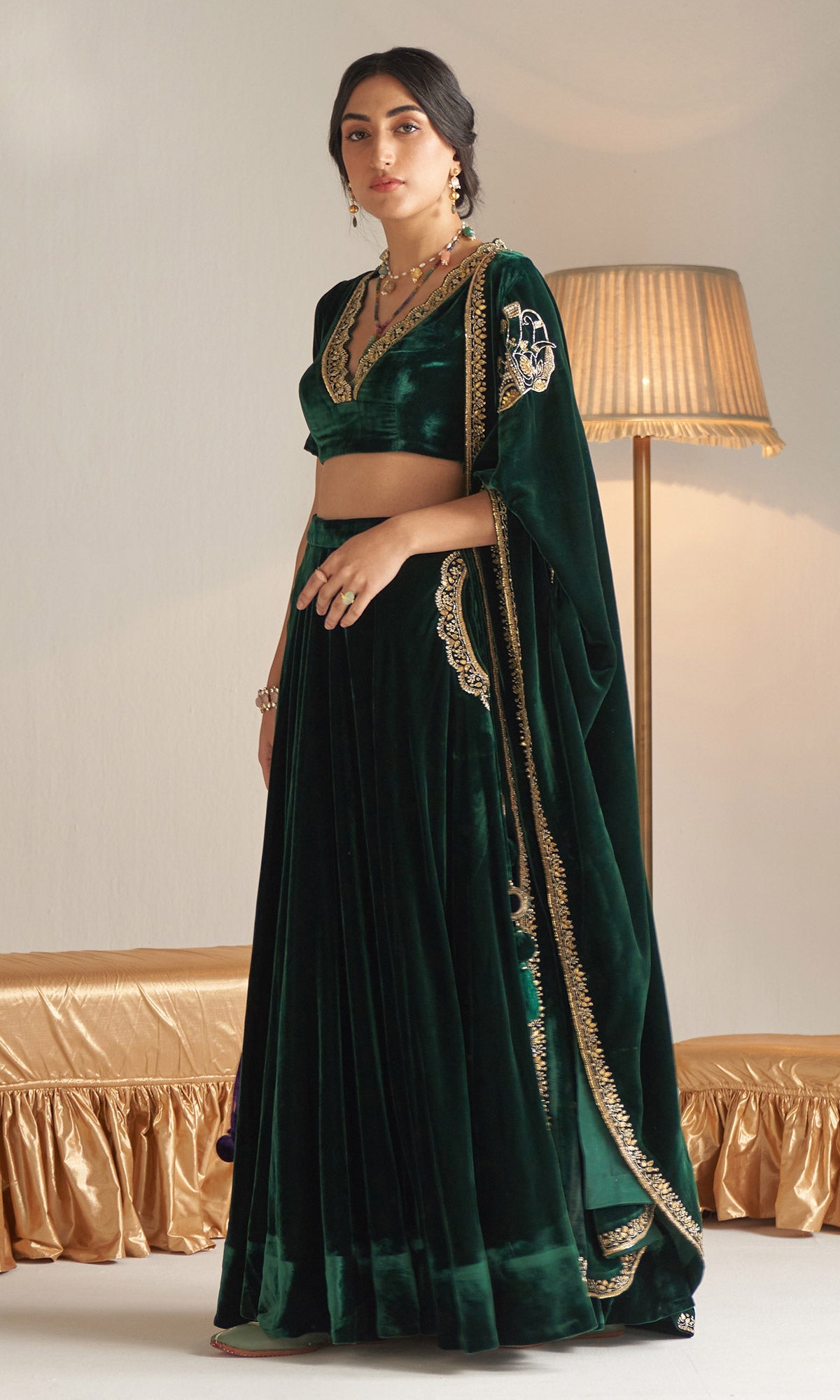 Khizaan Embroidered Emerald Green velvet Lehenga with blouse and shawl