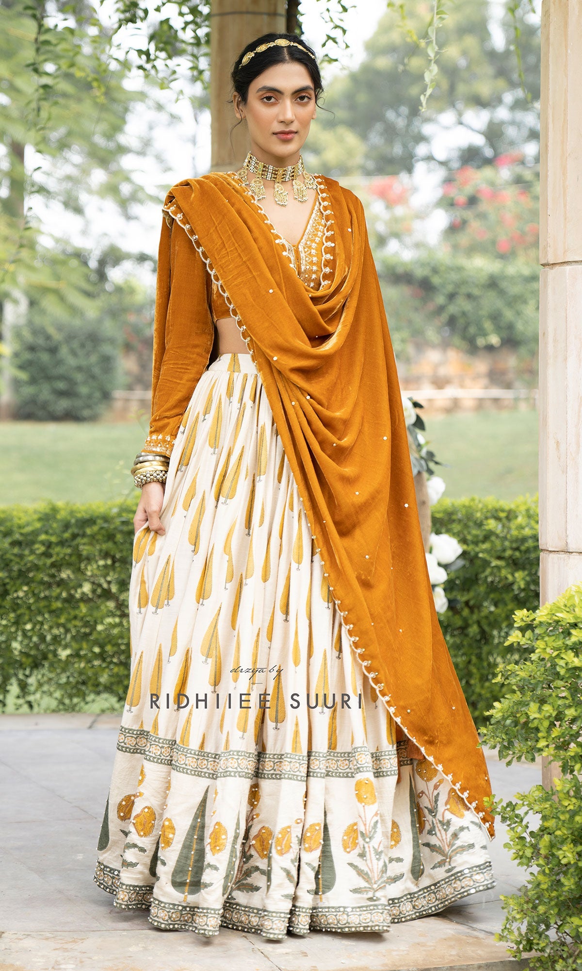 Bareen Mughals Mustard yellow block printed lehenga with velvet embroidered blouse & shawl- SET OF 3