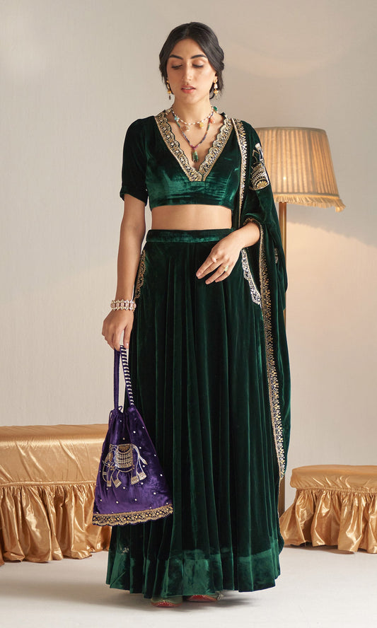 Khizaan Embroidered Emerald Green velvet Lehenga with blouse and shawl