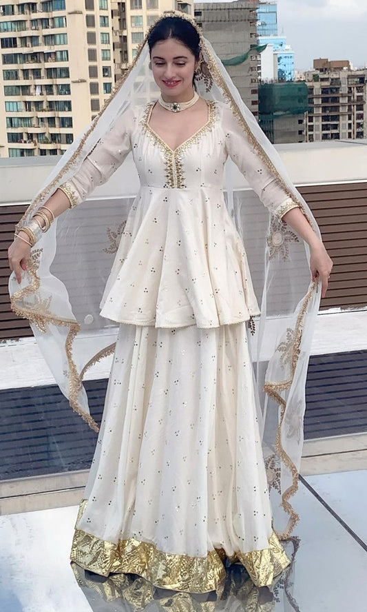 Divya Khosla Kumar in Jhilmil White Lehenga With Kurta And Dupatta Set Of 3
