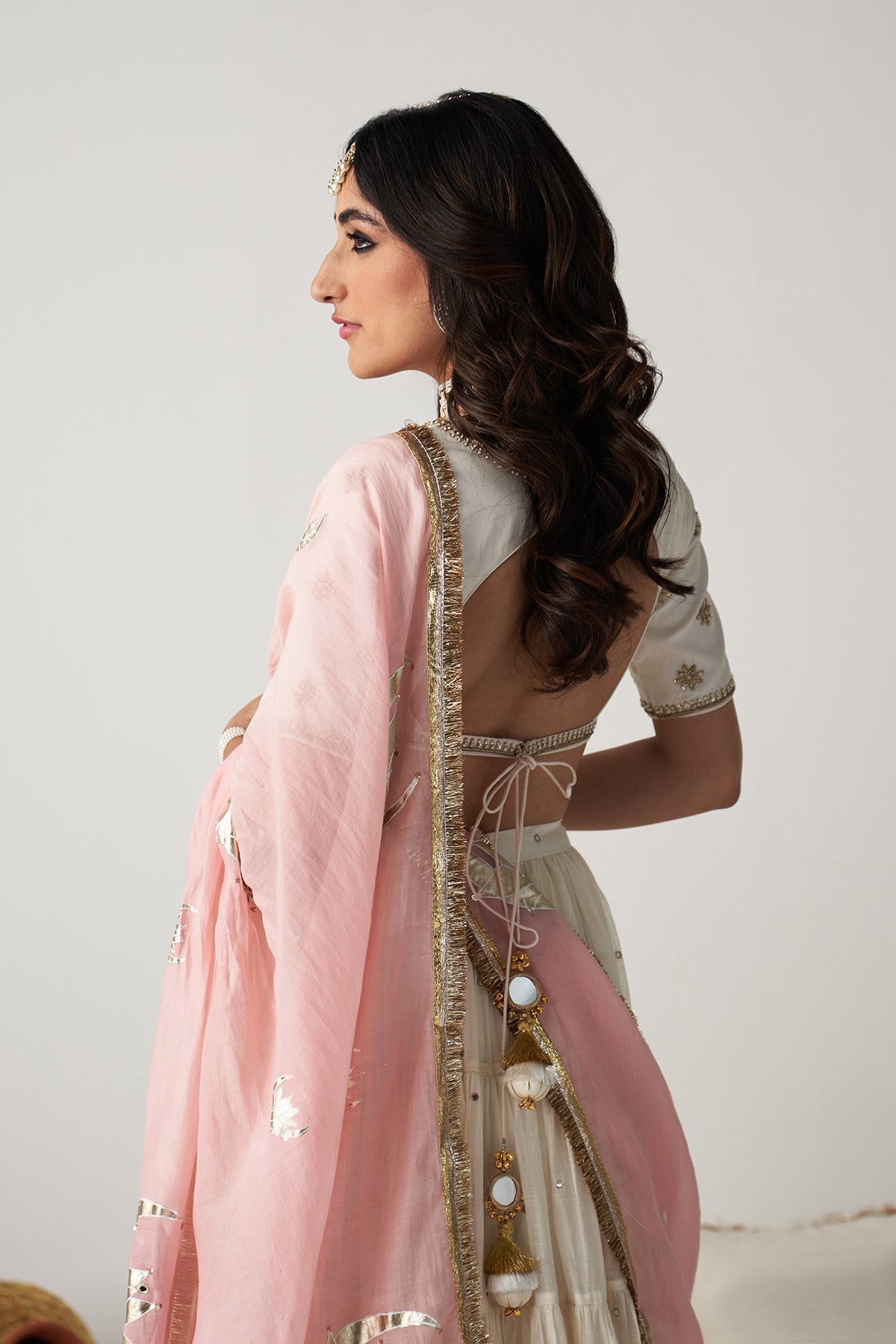 Pakeezah off white Tiered  lehenga with  embroidered blouse  and dusty  pink dupatta   (set of 3)